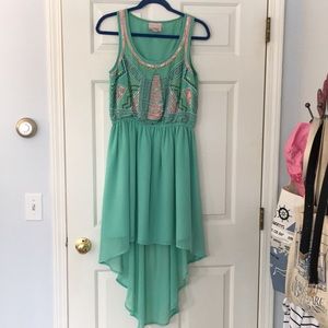 Turquoise high-low hem beaded dress